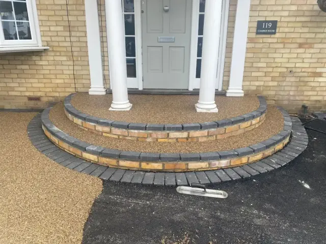 Gold resin approach with brick and block bullnose entrance steps